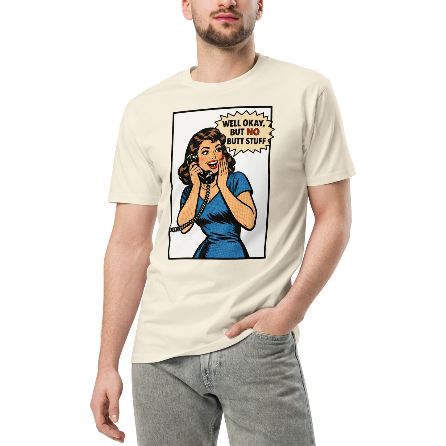 Person wearing a cream t-shirt with a graphic design of a woman on a phone and text.